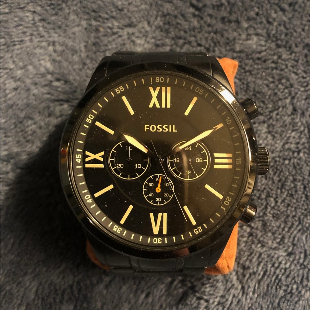 Fossil Watch. Excellent condition.  Extra links included for wrist adjustment.